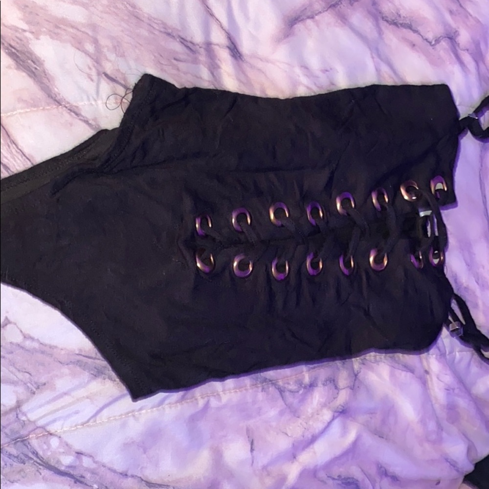 Black and gold bodysuit